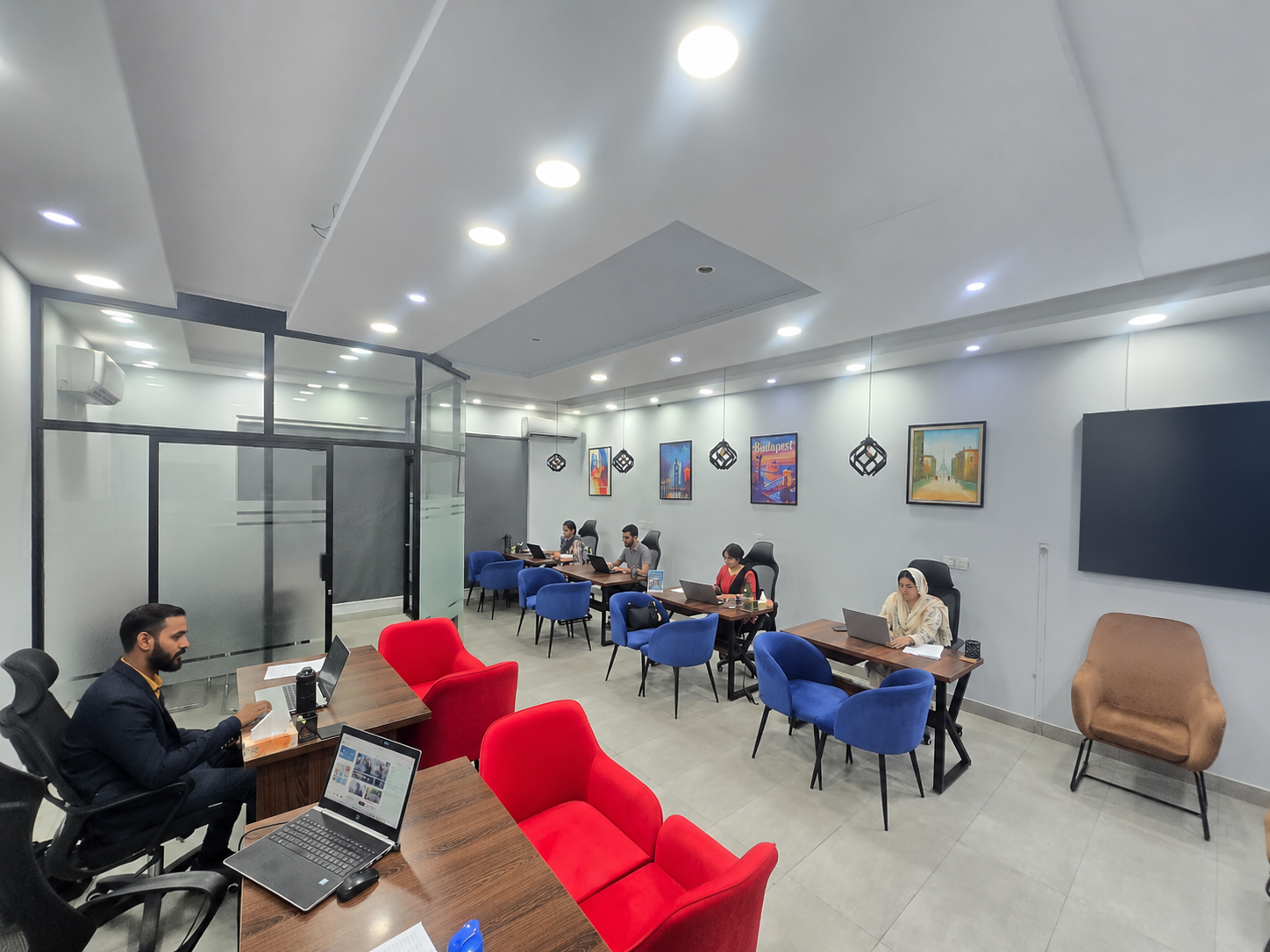 Opicka counsellors with a student at the Lahore office